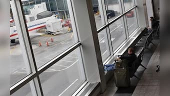 Plane lands without front landing gear at New York's LaGuardia Airport