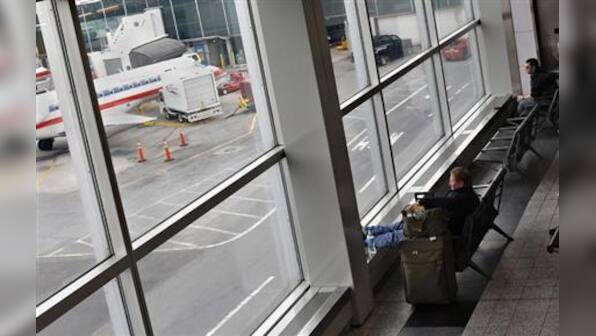 Plane lands without front landing gear at New York's LaGuardia Airport