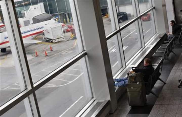 Plane lands without front landing gear at New York's LaGuardia Airport