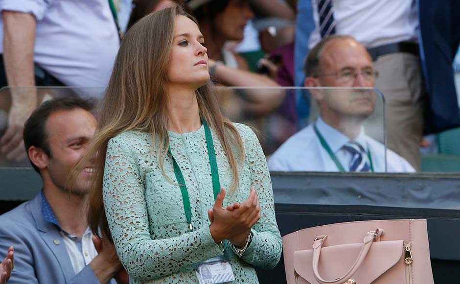 Kim Sears, girlfriend of Andy Murray of Britain, applauds on Centre Court during the match between Murray and Novak Djokovic. Stefan Wermuth/Reuters Kim Sears, girlfriend of Andy Murray of Britain, applauds on Centre Court during the match between Murray and Novak Djokovic. Stefan Wermuth/Reuters