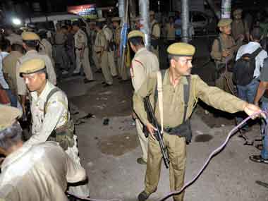 Security personnel cordon off an area after a grenade blast near Paltan Bazar in Guwahati on Sunday. PTI