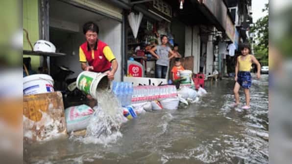 China floods: 63 killed in rain, landslides, 1.6 million people displaced