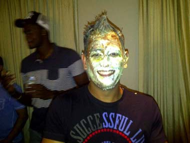 Birthday boy Dhoni has cake facial courtesy Indian, Windies players Birthday boy Dhoni has cake facial courtesy Indian, Windies players