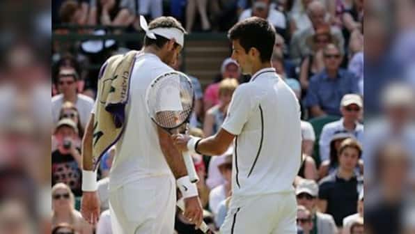 Djokovic fights to an epic win over del Potro
