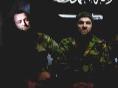 In a video posted on www.kavkazcenter.com, a mouthpiece for militants seeking an Islamist state, insurgent leader Doku Umarov (R) said an order not to attack Russian targets outside the North Caucasus had been cancelled. Reuters