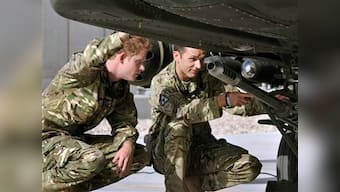 Prince Harry qualifies as Apache helicopter commander