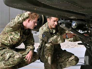 Prince Harry qualifies as Apache helicopter commander Prince Harry qualifies as Apache helicopter commander