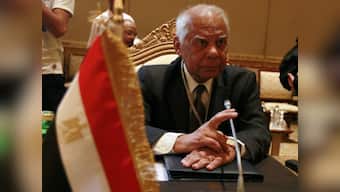 Egypt's new prime minister looks to form Cabinet, gets $8 bn boost