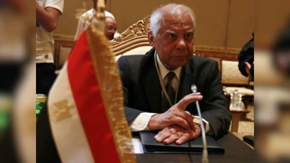 Egypt's new prime minister looks to form Cabinet, gets $8 bn boost