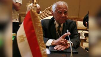 Egypt's interim PM forms government to restore civilian rule