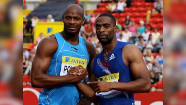 Sprinters Tyson Gay, Asafa Powell fail tests as doping scandal hits athletics