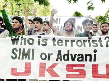 Muslim students shout slogans against India and its Home Minister Lal Krishna Advani in Srinagar 04 October 2001. The protestors were demonstrating against the banning of the country's leading Muslim students organization, the Student's Islamic Movement of India (SIMI), by the Indian government. AFP