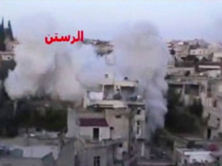Shelling by Syrian troops in Damascus kills 11