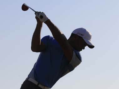 Tiger Woods plays a shot during a practice round for the 2013 British Open. AP