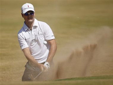 The Open Championship: Johnson leads while Woods lurks three shots back The Open Championship: Johnson leads while Woods lurks three shots back