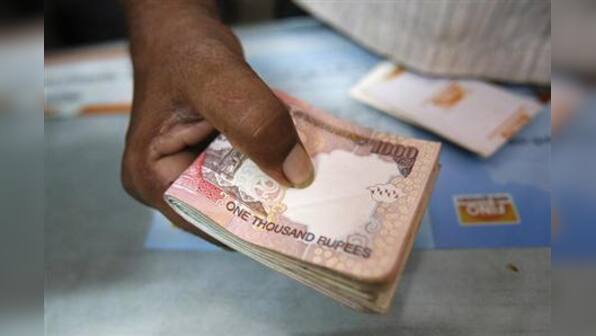 Rupee snaps three days of gain ahead of RBI rate decision – Firstpost