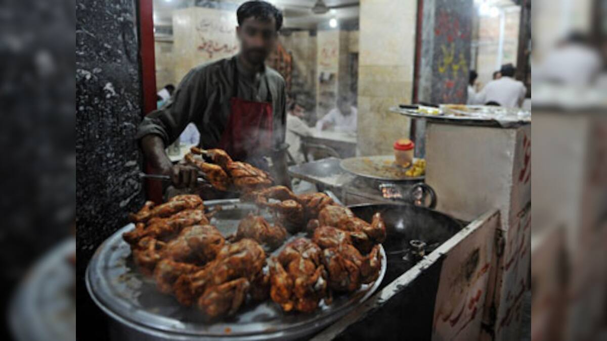 Pakistani cook accused of poisoning to death 22 in political feud ...