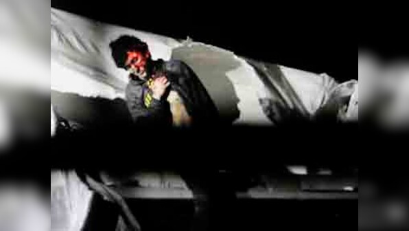 New photos of Boston bomber give glimpses into end of manhunt