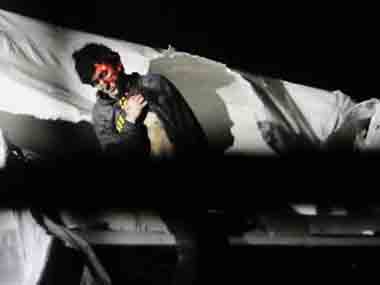 New photos of Boston bomber give glimpses into end of manhunt New photos of Boston bomber give glimpses into end of manhunt