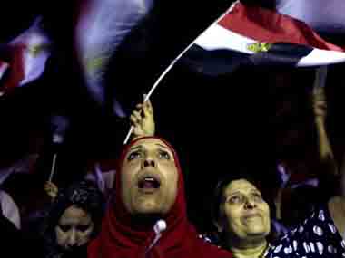 Egyptians in New York celebrate Morsi's overthrow, but remain wary of future Egyptians in New York celebrate Morsi's overthrow, but remain wary of future