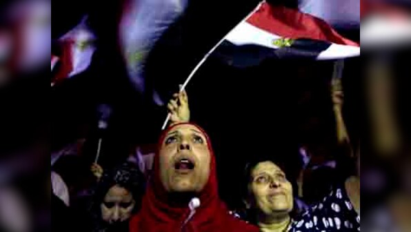 Egyptians in New York celebrate Morsi's overthrow, but remain wary of future