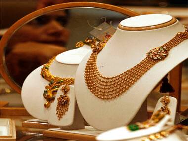Premiums rose four fold to $20 an ounce on London prices on Thursday after the Reserve Bank of India tightened gold imports, making them dependent on export volumes with an eye to reducing a record current account deficit.