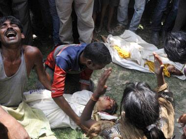 23 children died in Chhapra after consuming poisonous midday meal. AFP.