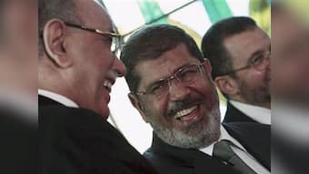 Egypt army chief meets commanders as deadline to Morsi expires