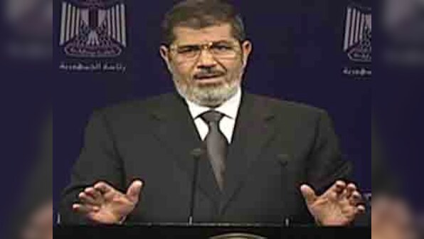 Clashes leave 23 dead as Morsi remains defiant 
