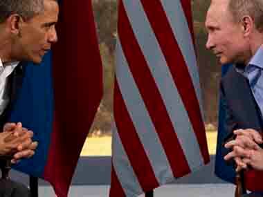 A file photo of Barack Obama with Russian President Vladimir Putin. AP image