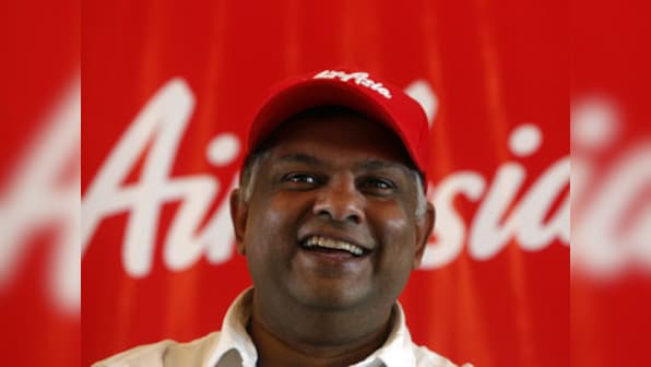 AirAsia CEO Tony Fernandes and chairman step aside as Airbus bribery allegations probed; airline shares drop