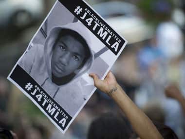 A poster seeking justice for Trayvon Martin. AFP