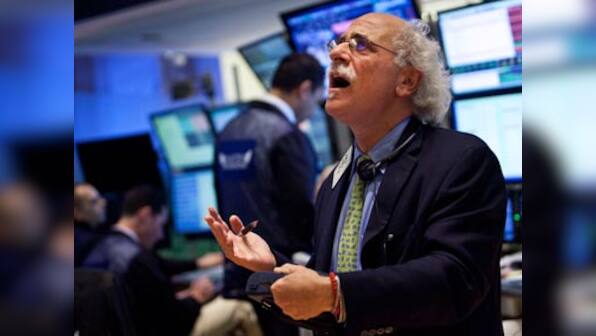 Global shares head for worst week since 2008 financial crisis as investors brace for coronavirus to morph into a pandemic