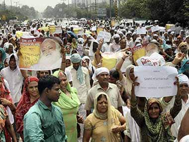  Supporters of Asaram Bapu holding a protest rally at Connaught Place in New Delhi. PTI 