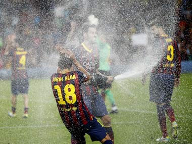 Barcelona survive Atletico scare to win Super Cup on away goals Barcelona survive Atletico scare to win Super Cup on away goals