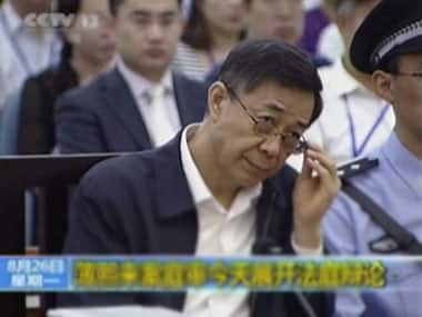 In this image taken from video, former Chinese politician Bo Xilai looks up in a court room at Jinan Intermediate People's Court in Jinan. AP