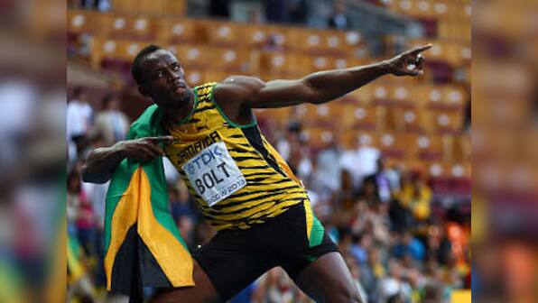 Bolt cruises to world 200m title in 19.66 seconds