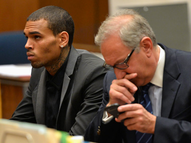Chris Brown turns himself in for hit-and-run case Chris Brown turns himself in for hit-and-run case