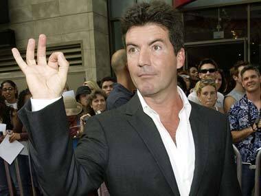 Simon Cowell expecting a baby... with his close friends wife