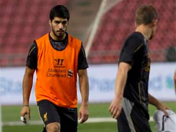 Selling Suarez to Arsenal 'ludicrous,' says Liverpool owner Selling Suarez to Arsenal 'ludicrous,' says Liverpool owner