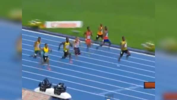 Watch Usain Bolt streak down the track to 200m gold