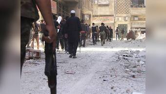 Syrian activists say nerve gas attack near Damascus killed 213