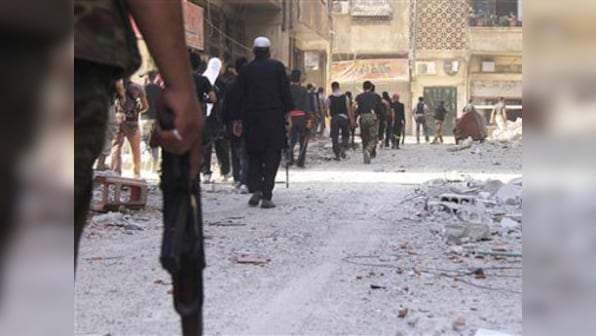 Syria crisis: Assad will repeat gas attacks if not punished, says UK