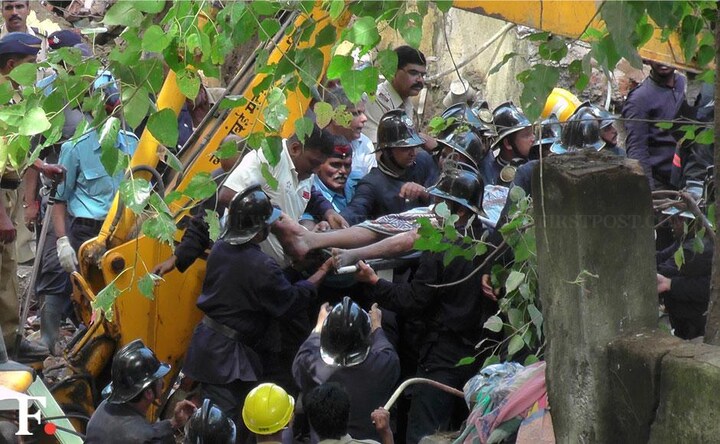 Photos: 5 dead, many still trapped after building collapses in Dockyard