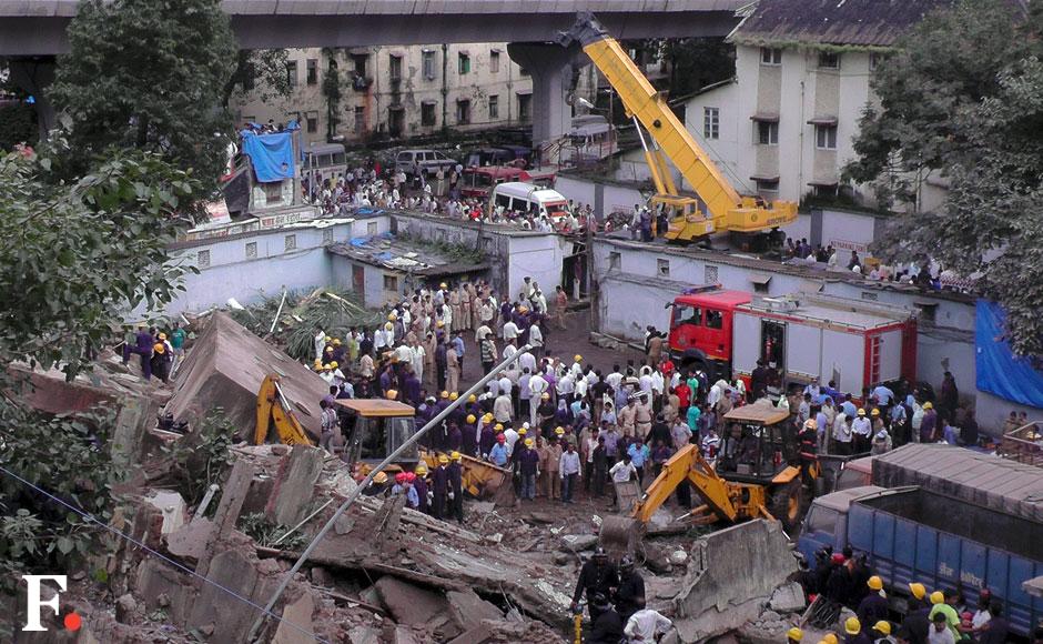 Photos: 5 dead, many still trapped after building collapses in Dockyard