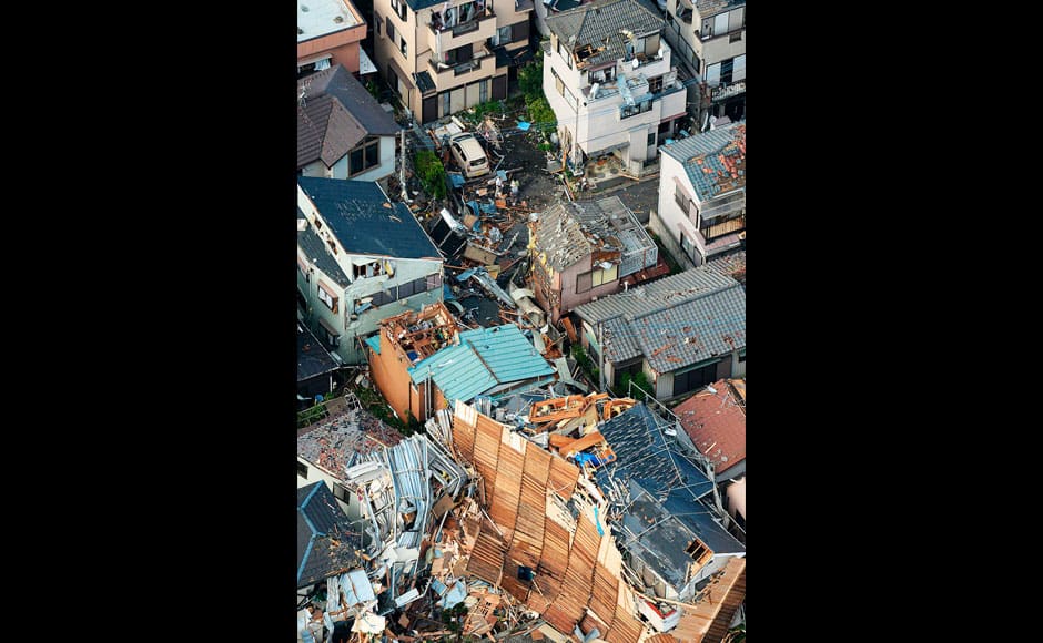 Photos Upturned cars, destroyed houses as tornado rips through Japan