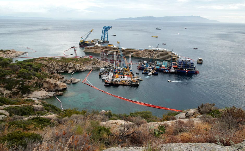 The capsized cruise liner Costa Concordia is seen at the end of the 