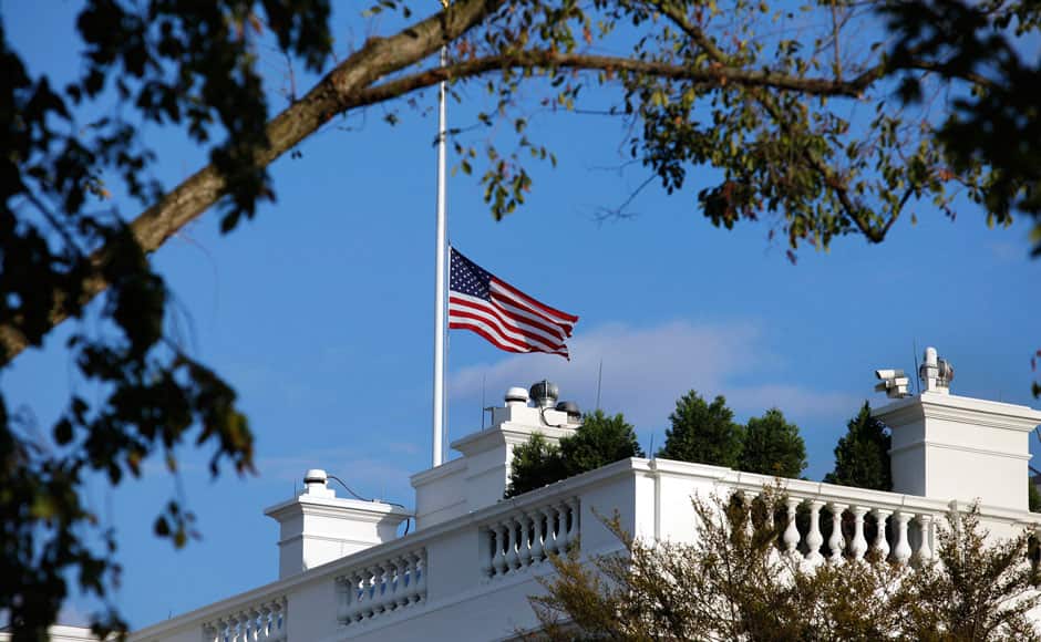 A U.S. flag flies at half staff at the White House September 16, 2013 in remembrance of victims of a shooting in the U.S. Navy Yard in Washington. A 34-year-old gunman opened fire at the Navy Yard in Washington in a shooting that left 13 people dead at the busy military installation not far from the U.S. Capitol and the White House. The suspect was identified by the FBI as Aaron Alexis of Fort Worth, Texas. Washington D.C. police chief Cathy Lanier told reporters that Alexis 