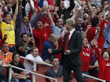 Liverpool, Arsenal claim narrow derby wins Liverpool, Arsenal claim narrow derby wins