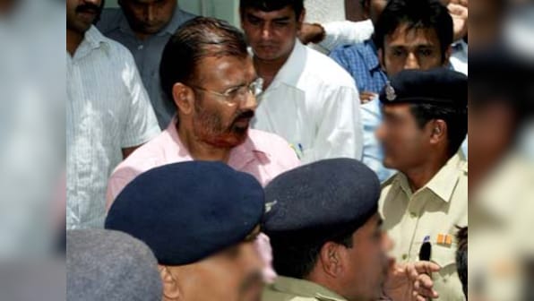 Suspended cop DG Vanzara quits, says his 'god' Modi let him down